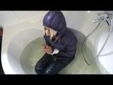 03:00 Min. video with Nina tied and gagged in a shiny nylon downjacket