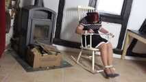 Aurora try to get free on chair 