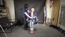Alice bound and gagged in a shiny nylon Downjacket