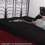 Cindy auf dem Bett in einem hogtie 2/2