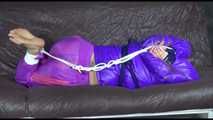 ***HOT SANDRA*** tied, gagged and hooded with ropes and a cloth gag on bed wearing a sexy purple shiny nylon down jacket and a rain pant (Video)