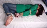 Patricia hogtied in Jeans