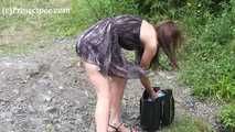 119018 Donna-Jo Takes A Relaxed Pee Into The Small Stream.
