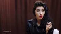 Badass chick in a leather jacket Anastasia casually dragging on a strong MORE RED 120mm