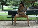 016080 Eve Takes A Pee From A Bench Beneath The Eiffel Tower