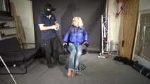 Alice bound and gagged in a shiny nylon Downjacket