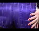 Pia trying on several shiny nylon shorts and rain jackets (Video)