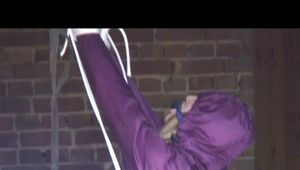 03:15 Min. video with Katharina tied and gagged in shiny nylon rainwear