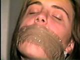 UK GIRL LISA WRAP TAPE GAGGED & TOE TIED (D34-10)