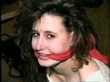 24 YEAR OLD ERICA IS MOUTH STUFFED, CLEAVE GAGGED, ROPE GAGGED & BALL-TIED WITH BLACK ELECTRICAL TAPE ON THE FLOOR (D51-16)