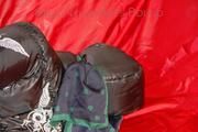 Sonja tied and gagged with ropes and a ball gag wearing a sexy grey shiny nylon rain pants and a black down jacket (Pics)