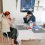 Jill and a friend of her enjoying a cup of coffee, smoking cigarettes at home while wearing supersexy blue and white rain- and downwear (Pics)