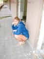 Leonie wearing a sexy shiny nylon shorts and a rain jacket posing for the camera (Pics)