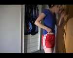 Sexy Sojna wearing a jeans and a tshirt trying on several shiny nylon shorts and posing (Video)
