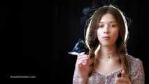 Really sexy babe Irina showing her smoking skills with a 120mm Cigaronne