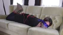 Vanessa hogtie on couch 2/2