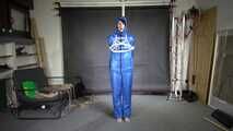 Myxxxy bound and gagged in a shiny nylon Skisuit