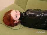 [From archive] Gatitta is mummified in black cling film