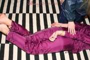 Watching sexy Alina being tied and gagged on the floor from Katharina both wearing sexy shiny nylon rainwear combinations (Pics)