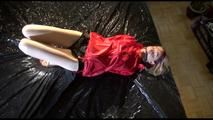 Sonja tied and gagged on bed wearing supersexy shiny nylon shorts and a rain jacket (Video)