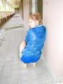 Leonie wearing a sexy shiny nylon shorts and a rain jacket posing for the camera (Pics)
