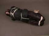 Get 4 classic videos with Lupi wearing shiny nylon rainwear beeing tied and gagged