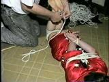TINY TINA IS HOG-TIED, WRAP TAPE GAGGED & TIED WITH ROPE & ELECTRICAL TAPE (D37-15)