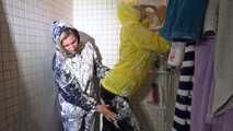Watching sexy Stella and Sandra having fun with shaving cream and eachother both wearing shiny nylon rainwear (Video)