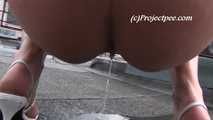 050039 Roxy Takes A Risky Rooftop Pee