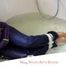 Nina tied and gagged in a shiny nylon down jacket and rainpants