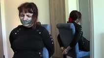 American Domme Shackled To a chair