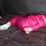 Watching sexy COURTNEY wearing pinj shiny nylon rainwear being tied and gagged with ropes (Video)