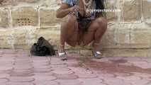 016199 Eve Takes A Pee At The Tourist Centre 