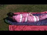03:50 Min. video with Julia tied and gagged in a shiny pink skisuit