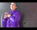 Get an Archive Video with Mara enjoying a shower with her shiny nylon downjacket