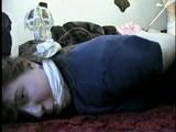 19 Yr OLD CRYSTAL IS CLEAVE GAGGED, SMELLS HER STINKY NYLONS, BAREFOOT, TOE-TIED & HOG-TIED ON THE FLOOR (D56-8)