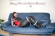 Jill tied and gagged wearing shiny nylon oldschool downwear (Pics)