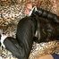 one of our archive girls bound and gagged in a shiny nylon down jacket