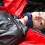 Simone tied and gagged in a big shiny nylon bag to lie in wearing a black shiny nylon shorts and a black shiny nylon rainjacket (Pics)