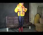 Sexy Mara trying on her new yellow down jacket and her lifevest in combination with a sexy shiny black rain pants and rubber boots (Video)