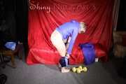Watching sexy Sonja wearing a supersexy oldschool blue shiny nylon shorts and a lightblue rain jacket during her workout with barbells (Pics)
