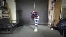 Poor Marie bound and gagged in a shiny nylon Windbreaker