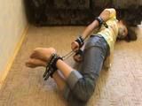 Valya hogtied in jeans
