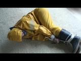 03:20 Min. video with Katharina bound in a yellow rainsuit