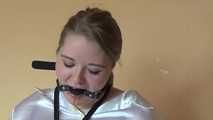 Sandra chairtied and drooling 2/2