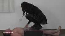 Mistress Cleo's smoke break at the slave's happy finish 