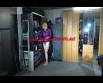Pia trying on several shiny nylon shorts and rain jackets (Video)