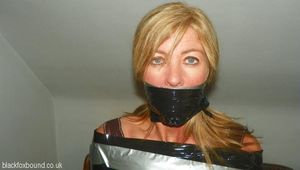 Buxom blonde wrapped