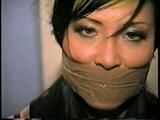 30 YR OLD ASIAN LI-JUN IS WRAP TAPE GAGGED, BALL-TIED, TOE-TIED IN PANTYHOSE (D55-11)