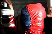 Katharina tied and gagged in shiny nylon rainwear